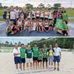 Estudantes na pista de atletismo e na quadra de areia.